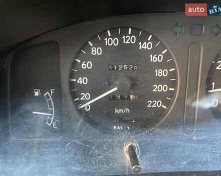 Красный Тойота Королла, объемом двигателя 1.33 л и пробегом 412 тыс. км за 2500 $, фото 8 на Automoto.ua