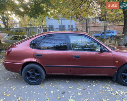 Красный Тойота Королла, объемом двигателя 1.33 л и пробегом 412 тыс. км за 2500 $, фото 2 на Automoto.ua