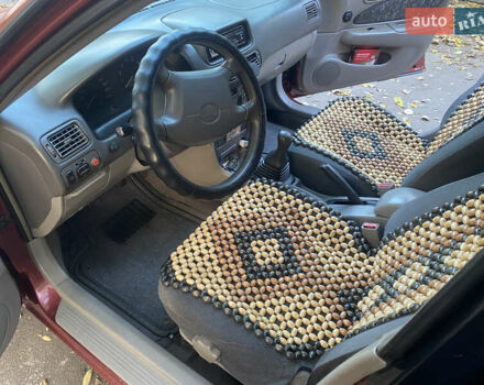 Красный Тойота Королла, объемом двигателя 1.33 л и пробегом 412 тыс. км за 2500 $, фото 6 на Automoto.ua