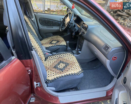 Красный Тойота Королла, объемом двигателя 1.33 л и пробегом 412 тыс. км за 2500 $, фото 4 на Automoto.ua