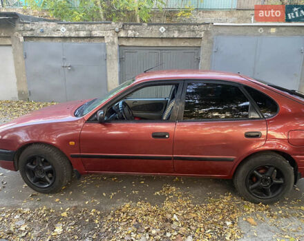 Красный Тойота Королла, объемом двигателя 1.33 л и пробегом 412 тыс. км за 2500 $, фото 3 на Automoto.ua