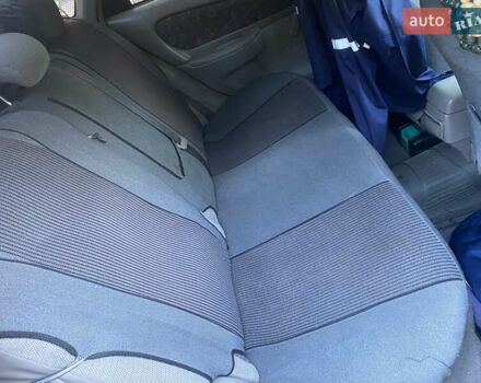 Красный Тойота Королла, объемом двигателя 1.33 л и пробегом 412 тыс. км за 2500 $, фото 5 на Automoto.ua