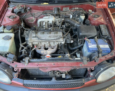 Красный Тойота Королла, объемом двигателя 1.33 л и пробегом 412 тыс. км за 2500 $, фото 11 на Automoto.ua