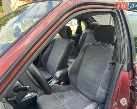 Красный Тойота Королла, объемом двигателя 1.6 л и пробегом 240 тыс. км за 2850 $, фото 16 на Automoto.ua