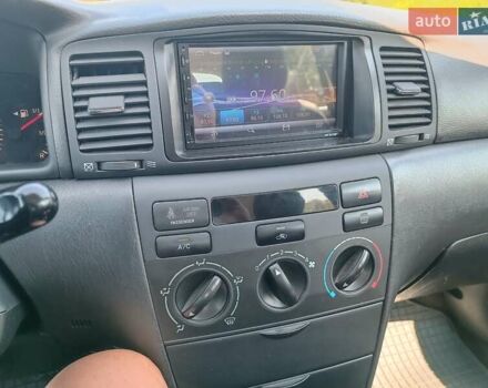 Червоний Тойота Королла, об'ємом двигуна 1.6 л та пробігом 241 тис. км за 4200 $, фото 14 на Automoto.ua