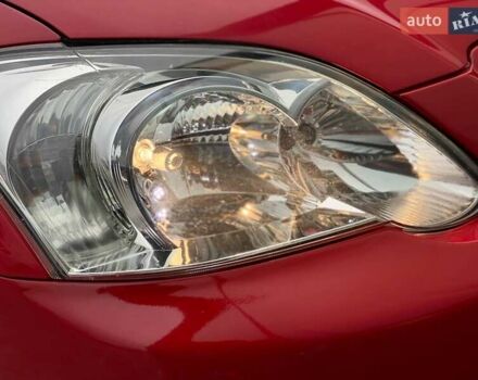 Червоний Тойота Королла, об'ємом двигуна 1.6 л та пробігом 302 тис. км за 6490 $, фото 18 на Automoto.ua