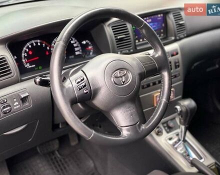 Червоний Тойота Королла, об'ємом двигуна 1.6 л та пробігом 302 тис. км за 6490 $, фото 27 на Automoto.ua