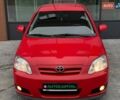 Червоний Тойота Королла, об'ємом двигуна 1.6 л та пробігом 302 тис. км за 6490 $, фото 4 на Automoto.ua