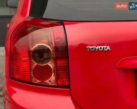 Червоний Тойота Королла, об'ємом двигуна 1.6 л та пробігом 302 тис. км за 6490 $, фото 13 на Automoto.ua
