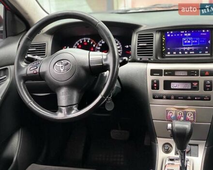 Червоний Тойота Королла, об'ємом двигуна 1.6 л та пробігом 302 тис. км за 6490 $, фото 44 на Automoto.ua