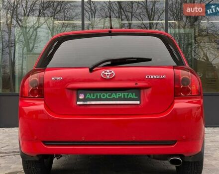 Червоний Тойота Королла, об'ємом двигуна 1.6 л та пробігом 302 тис. км за 6490 $, фото 9 на Automoto.ua