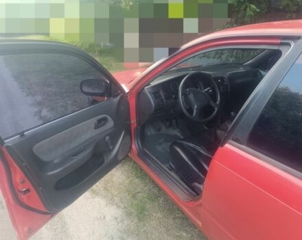 Красный Тойота Королла, объемом двигателя 2 л и пробегом 500 тыс. км за 1800 $, фото 4 на Automoto.ua