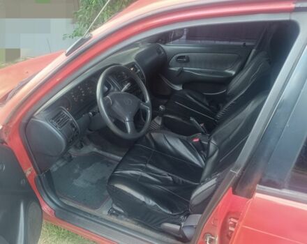 Красный Тойота Королла, объемом двигателя 2 л и пробегом 500 тыс. км за 1800 $, фото 3 на Automoto.ua