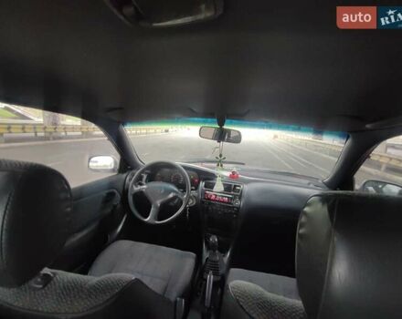 Красный Тойота Королла, объемом двигателя 1.4 л и пробегом 422 тыс. км за 2200 $, фото 7 на Automoto.ua