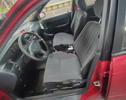 Красный Тойота Королла, объемом двигателя 1.4 л и пробегом 422 тыс. км за 2200 $, фото 2 на Automoto.ua