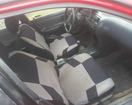 Красный Тойота Королла, объемом двигателя 1.3 л и пробегом 496 тыс. км за 1600 $, фото 2 на Automoto.ua