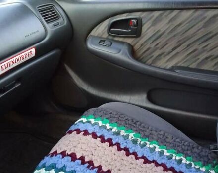 Червоний Тойота Королла, об'ємом двигуна 1.33 л та пробігом 335 тис. км за 2000 $, фото 3 на Automoto.ua