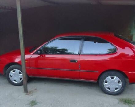 Червоний Тойота Королла, об'ємом двигуна 1.33 л та пробігом 335 тис. км за 2000 $, фото 5 на Automoto.ua