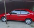 Червоний Тойота Королла, об'ємом двигуна 1.33 л та пробігом 335 тис. км за 2000 $, фото 5 на Automoto.ua