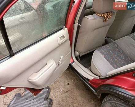 Червоний Тойота Королла, об'ємом двигуна 1.4 л та пробігом 270 тис. км за 1300 $, фото 28 на Automoto.ua