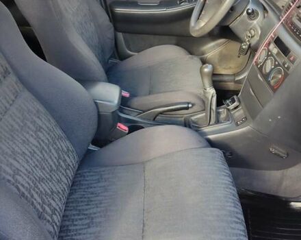 Красный Тойота Королла, объемом двигателя 1.6 л и пробегом 130 тыс. км за 4700 $, фото 11 на Automoto.ua