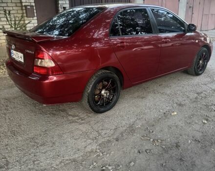 Красный Тойота Королла, объемом двигателя 1.4 л и пробегом 235 тыс. км за 3700 $, фото 6 на Automoto.ua