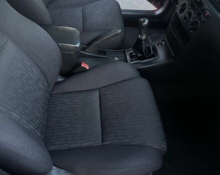 Красный Тойота Королла, объемом двигателя 1.4 л и пробегом 235 тыс. км за 3700 $, фото 11 на Automoto.ua