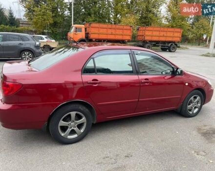 Червоний Тойота Королла, об'ємом двигуна 1.79 л та пробігом 250 тис. км за 5100 $, фото 4 на Automoto.ua