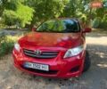 Красный Тойота Королла, объемом двигателя 1.6 л и пробегом 99 тыс. км за 7299 $, фото 1 на Automoto.ua