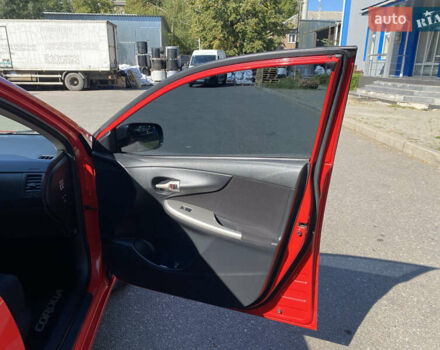Красный Тойота Королла, объемом двигателя 1.6 л и пробегом 116 тыс. км за 9425 $, фото 20 на Automoto.ua
