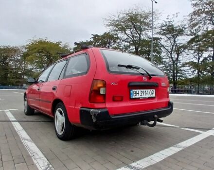 Красный Тойота Королла, объемом двигателя 1.3 л и пробегом 379 тыс. км за 1800 $, фото 7 на Automoto.ua