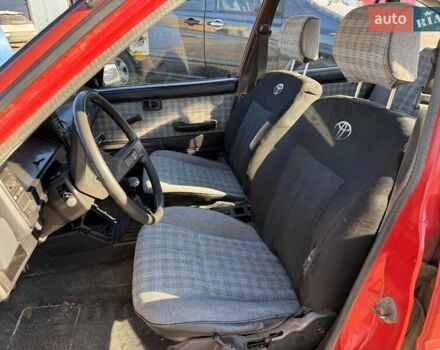 Красный Тойота Королла, объемом двигателя 1.3 л и пробегом 100 тыс. км за 500 $, фото 7 на Automoto.ua