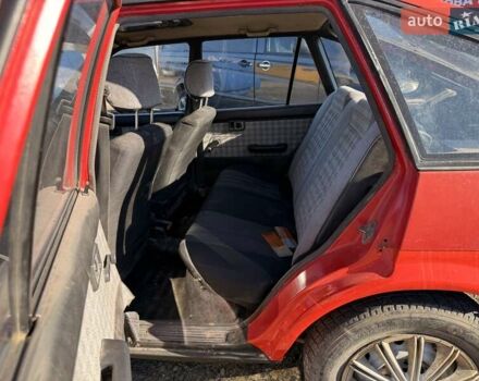 Красный Тойота Королла, объемом двигателя 1.3 л и пробегом 100 тыс. км за 500 $, фото 6 на Automoto.ua