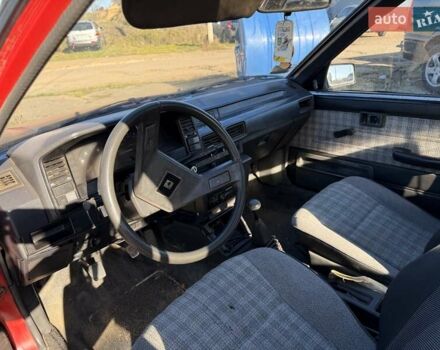 Красный Тойота Королла, объемом двигателя 1.3 л и пробегом 100 тыс. км за 500 $, фото 1 на Automoto.ua