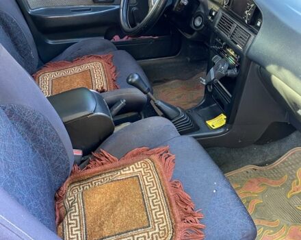 Красный Тойота Королла, объемом двигателя 1.3 л и пробегом 200 тыс. км за 1300 $, фото 8 на Automoto.ua