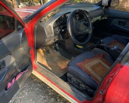 Красный Тойота Королла, объемом двигателя 1.3 л и пробегом 200 тыс. км за 1300 $, фото 9 на Automoto.ua