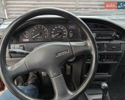 Червоний Тойота Королла, об'ємом двигуна 1.3 л та пробігом 374 тис. км за 2350 $, фото 14 на Automoto.ua