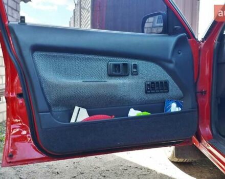 Червоний Тойота Королла, об'ємом двигуна 1.3 л та пробігом 374 тис. км за 2350 $, фото 12 на Automoto.ua