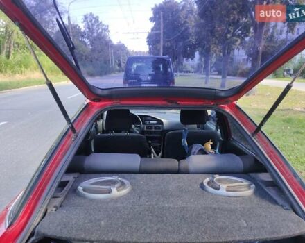Червоний Тойота Королла, об'ємом двигуна 1.3 л та пробігом 374 тис. км за 2350 $, фото 7 на Automoto.ua