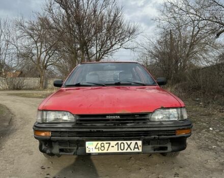 Красный Тойота Королла, объемом двигателя 1.3 л и пробегом 180 тыс. км за 700 $, фото 1 на Automoto.ua