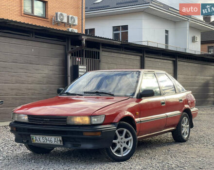 Красный Тойота Королла, объемом двигателя 1.3 л и пробегом 100 тыс. км за 1100 $, фото 1 на Automoto.ua