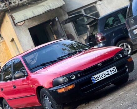 Красный Тойота Королла, объемом двигателя 1.3 л и пробегом 180 тыс. км за 1600 $, фото 1 на Automoto.ua