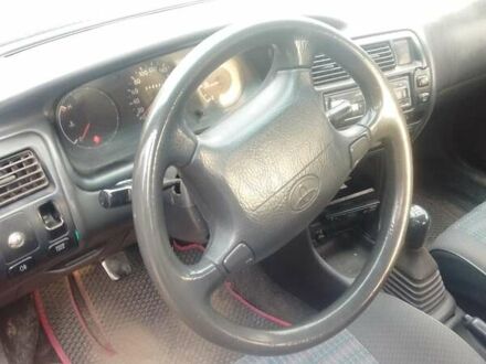 Красный Тойота Королла, объемом двигателя 1.3 л и пробегом 396 тыс. км за 2500 $, фото 1 на Automoto.ua