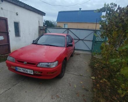 Червоний Тойота Королла, об'ємом двигуна 1.3 л та пробігом 289 тис. км за 2100 $, фото 1 на Automoto.ua