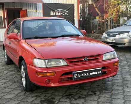 Красный Тойота Королла, объемом двигателя 1.6 л и пробегом 290 тыс. км за 1300 $, фото 1 на Automoto.ua