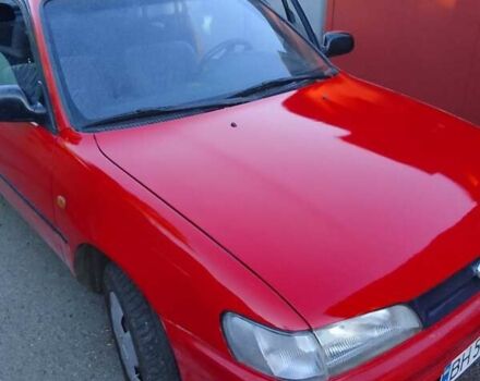 Красный Тойота Королла, объемом двигателя 1.33 л и пробегом 335 тыс. км за 2000 $, фото 1 на Automoto.ua