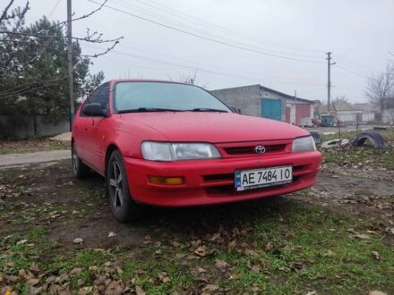 Красный Тойота Королла, объемом двигателя 1.3 л и пробегом 300 тыс. км за 3000 $, фото 1 на Automoto.ua