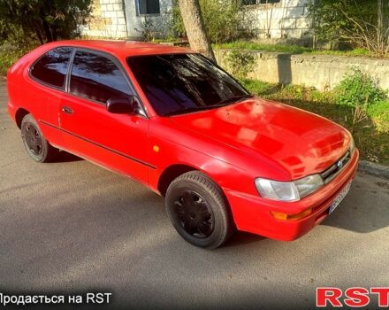 Красный Тойота Королла, объемом двигателя 1.3 л и пробегом 350 тыс. км за 2580 $, фото 1 на Automoto.ua