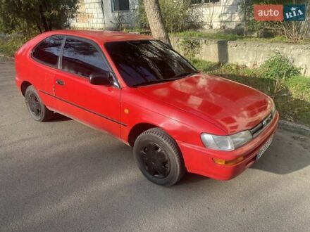 Красный Тойота Королла, объемом двигателя 1.3 л и пробегом 300 тыс. км за 2850 $, фото 1 на Automoto.ua