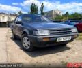 Серый Тойота Королла, объемом двигателя 1.3 л и пробегом 250 тыс. км за 900 $, фото 1 на Automoto.ua